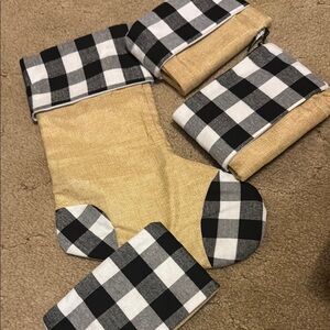 Christmas Stockings (Set of 4) approximately 15” deep and 12” wide at foot.